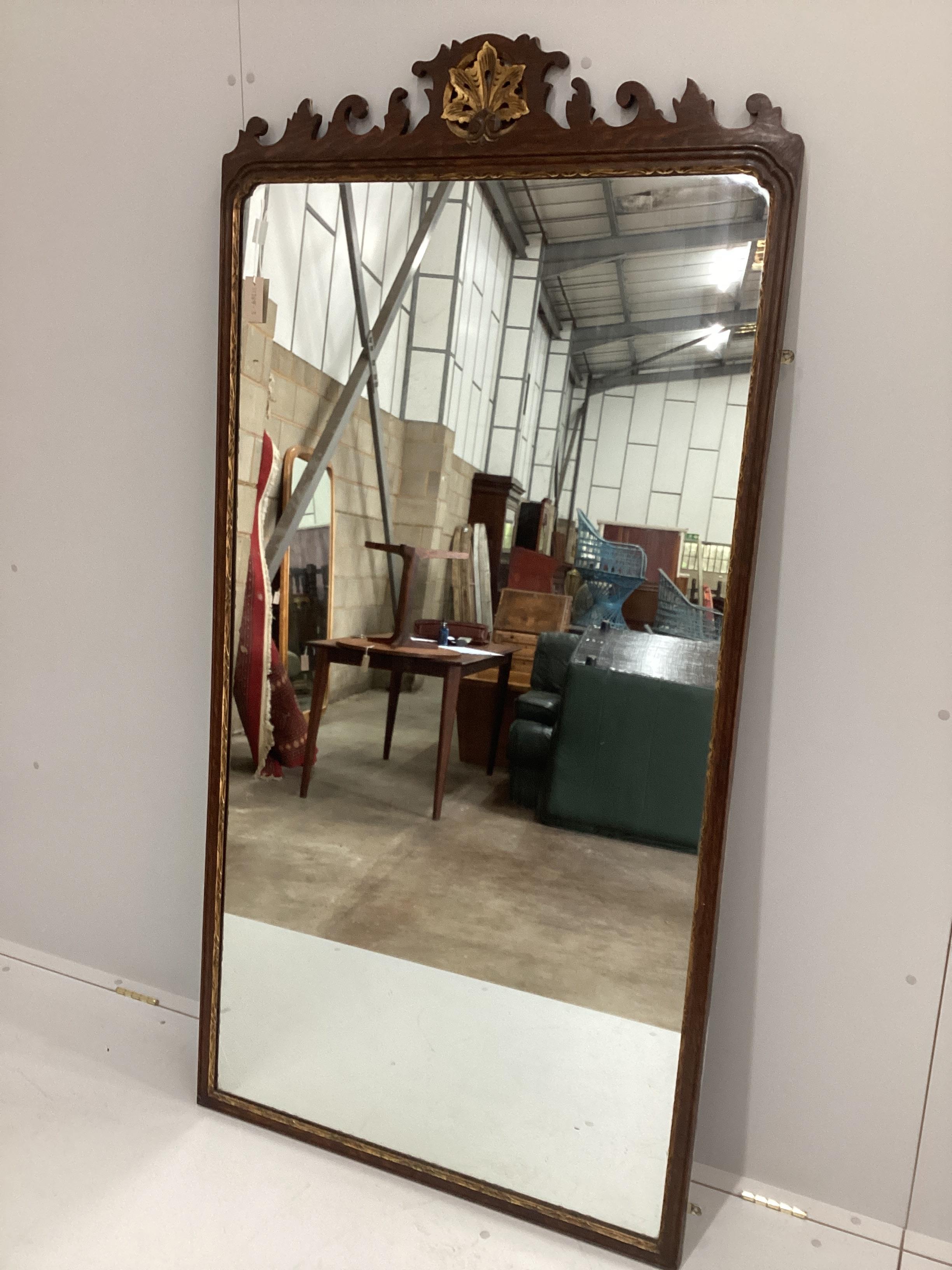 A large George III style parcel gilt oak fret cut pier glass, width 92cm, height 183cm